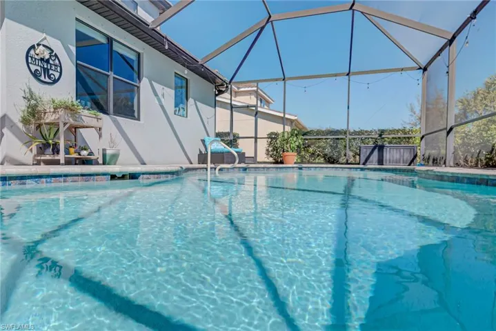 Swimming pool featuring a lanai, and a patio area