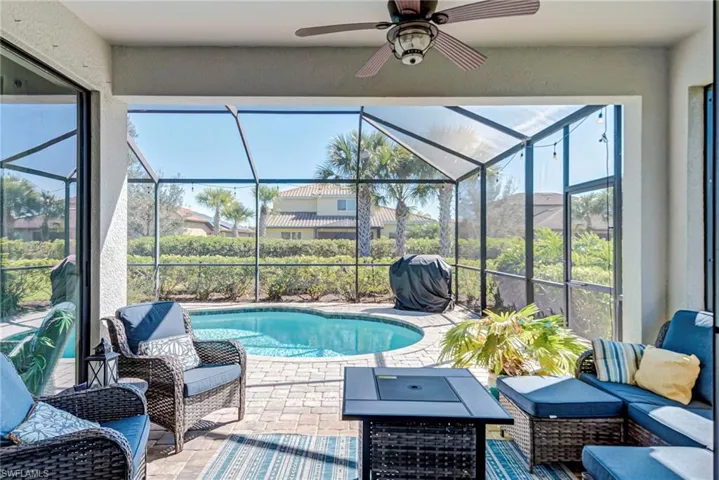 Outdoor pool with an outdoor living space