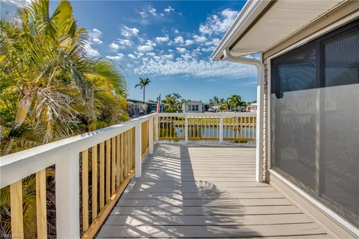 Balcony with a deck with water view