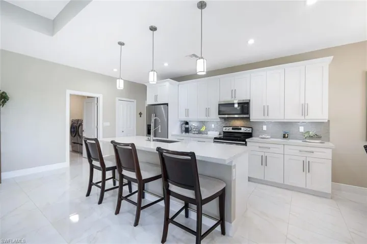 411 24th AVE NE, NAPLES FL 34120