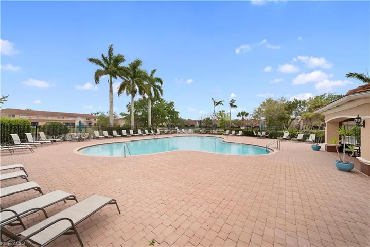 Community pool featuring a patio area