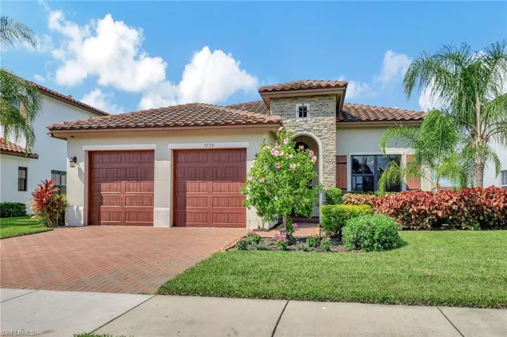Optional stone front entry elevation.  Model perfect, move-in ready