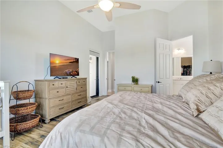 Master bedroom featuring showing lanai entrance door on the left