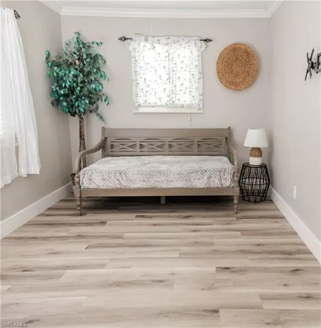 Bedroom with ornamental molding