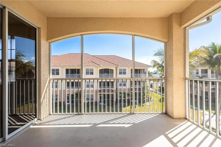 Unfurnished sunroom featuring plenty of natural light