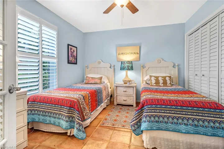 The spacious guest room gets lots of natural light.