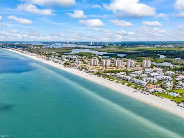 View of urban area with waterfront with a beach