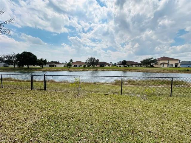 Water view with nearby suburban area