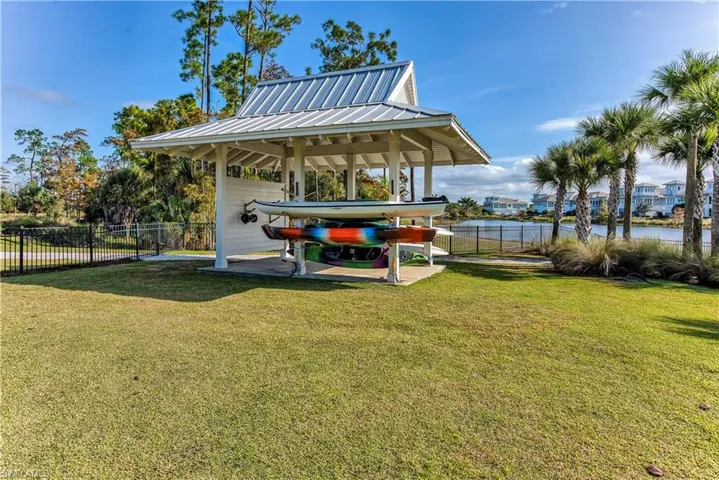 View of yard with a water view