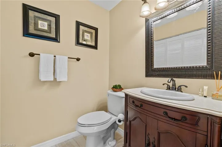 Bathroom featuring toilet and vanity