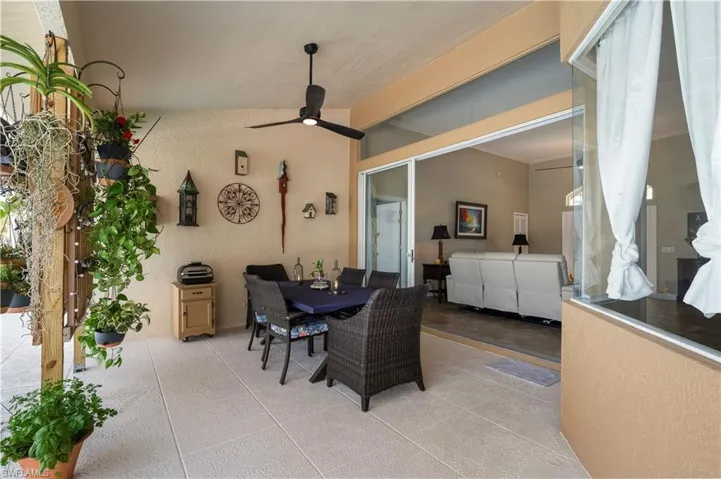 View of patio / terrace with ceiling fan and outdoor dining space