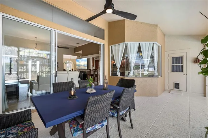 View of patio / terrace featuring a ceiling fan and outdoor dining area
