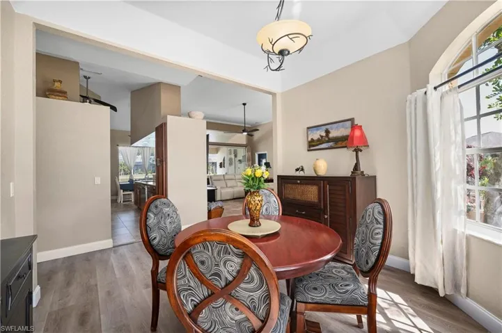 Dining room featuring baseboards and wood finished floors