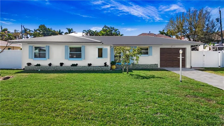Photo includes reality renovation to showcase the possibility of the exterior. Design services included with purchase!
