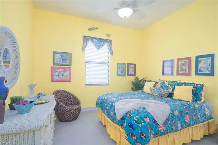 Bedroom with carpet flooring and ceiling fan
