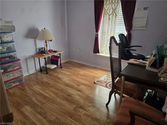 Office area with wood-type flooring