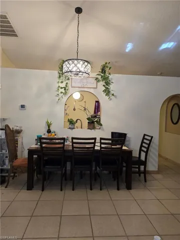 Dining room featuring tile patterned flooring