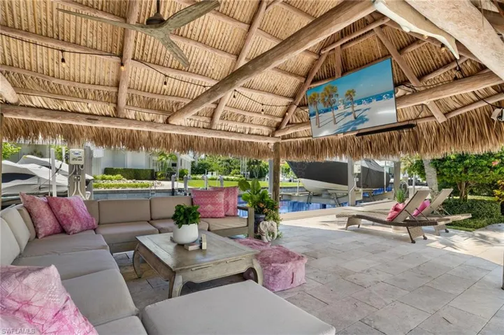 View of terrace featuring an outdoor hangout area, ceiling fan, and a gazebo