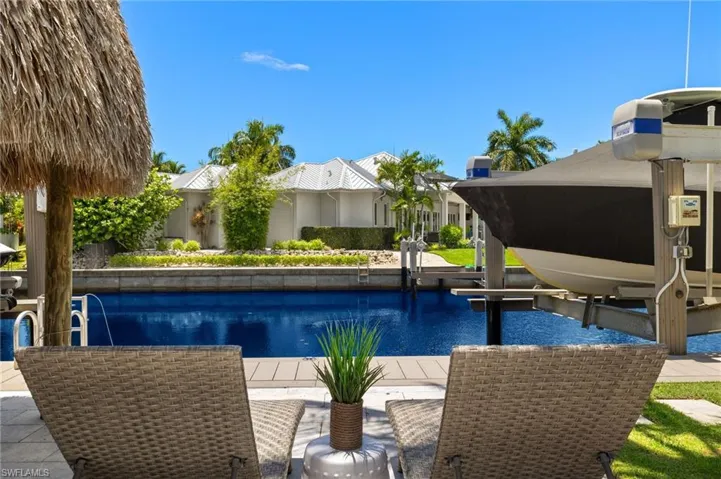 View of pool featuring pool water feature