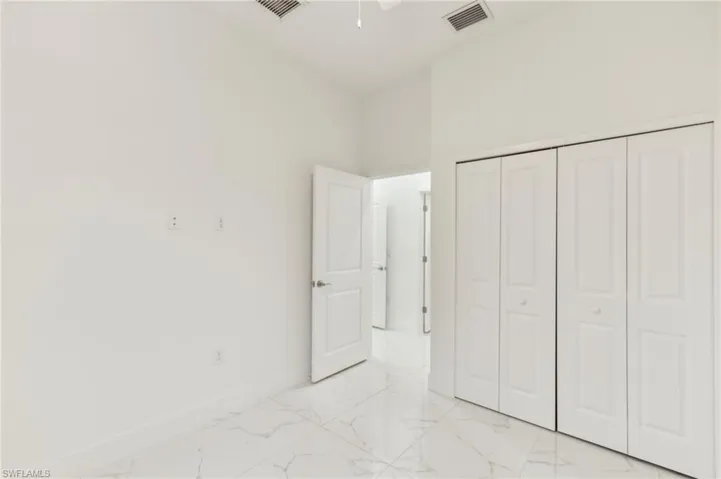 Unfurnished bedroom featuring a closet