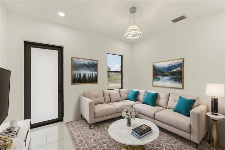 Living room with an inviting chandelier