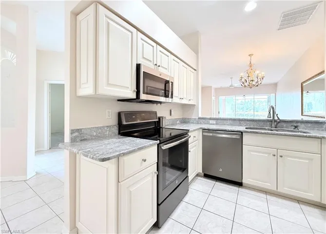 Refaced Cabinets and Granite Counter Tops