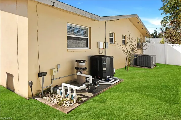 Back of property with stucco siding