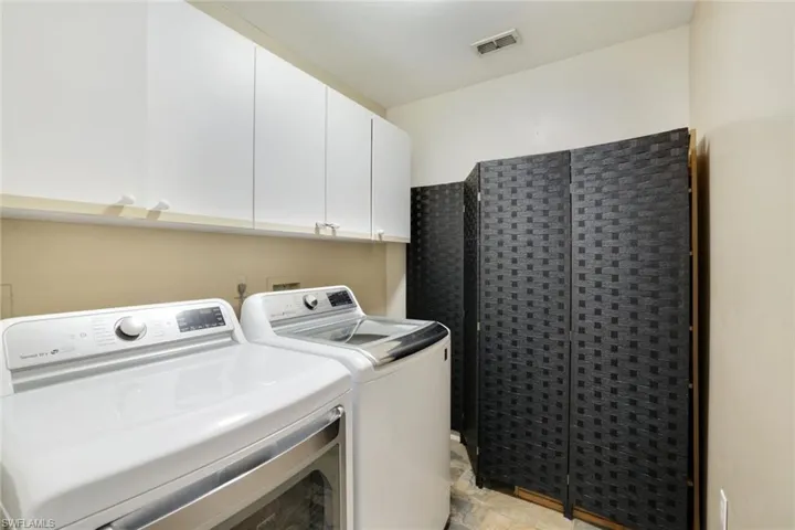 Washroom with separate washer and dryer