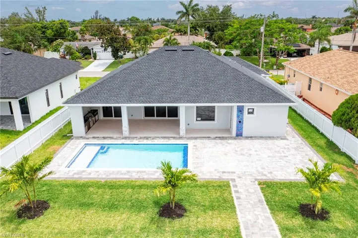 View of pool featuring a patio area and a fenced backyard