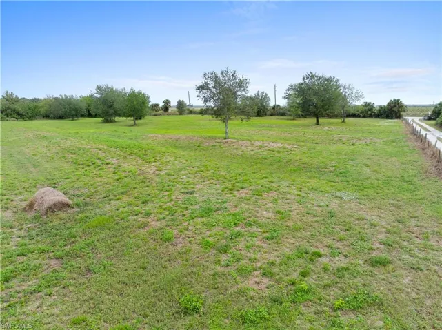 View of yard with a rural view