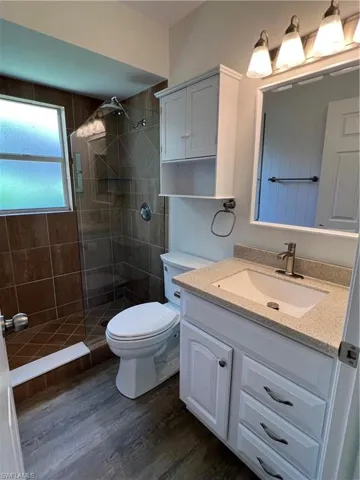Master bath with new toilet and rain shower head
