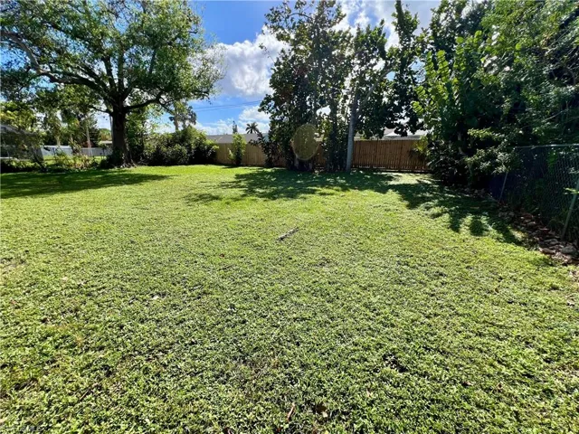 View of fenced backyard