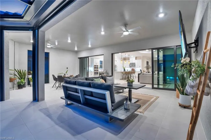 Tiled living room with ceiling fan