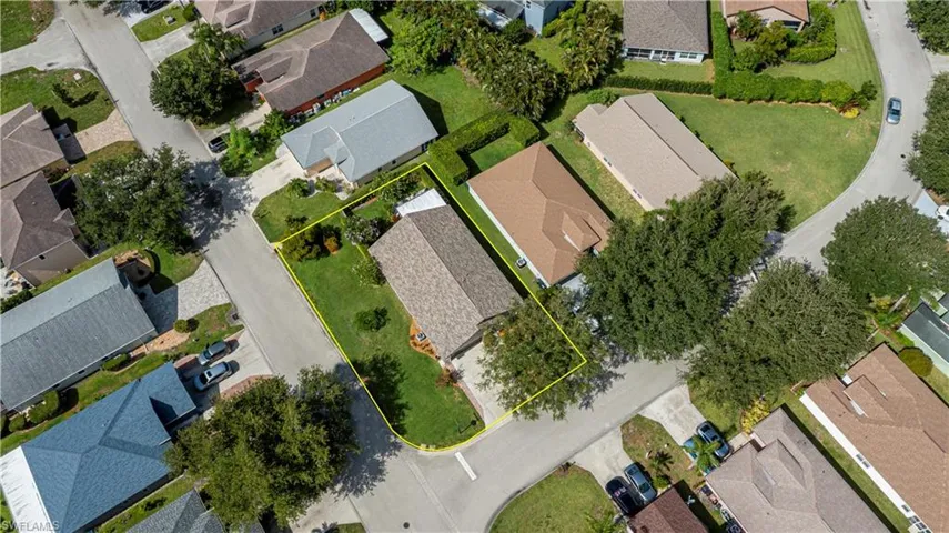 Aerial perspective of suburban area with property parcel outlined