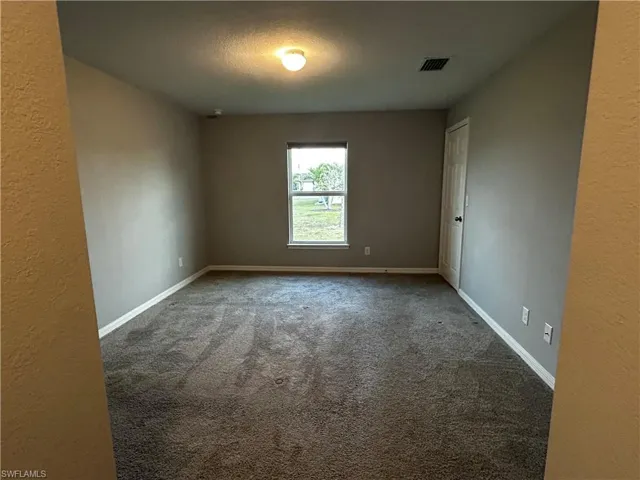 View from closet and bathroom area