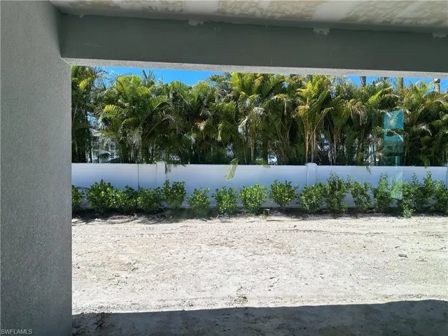 Backyard with private fencing and landscaping