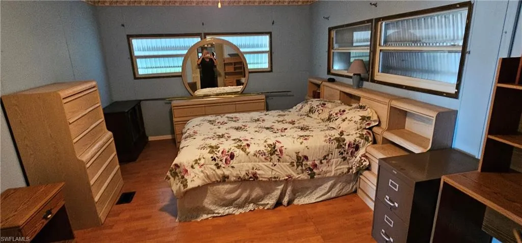 Bedroom featuring hardwood / wood-style flooring