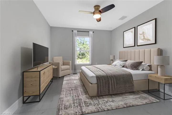 Bedroom with baseboards and a ceiling fan