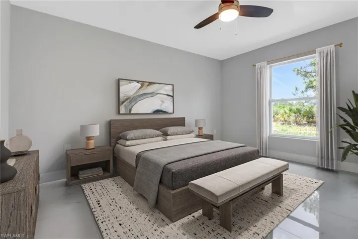 Bedroom with baseboards and a ceiling fan
