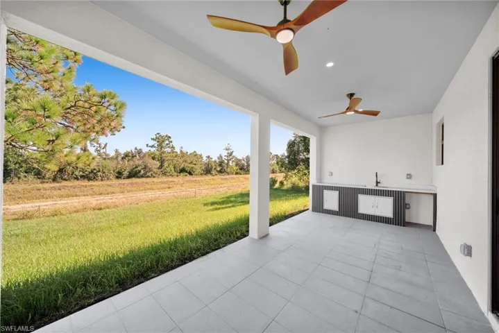 View of patio / terrace featuring ceiling fan