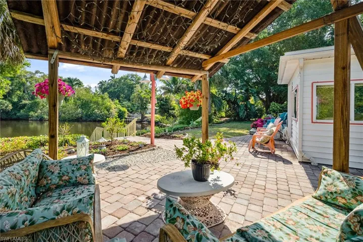 View of patio / terrace featuring a water view