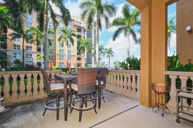 View of patio / terrace featuring dining area overlooking pool and river!