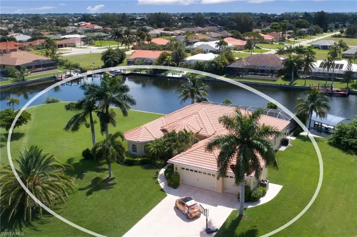 Aerial view of residential area with a nearby body of water