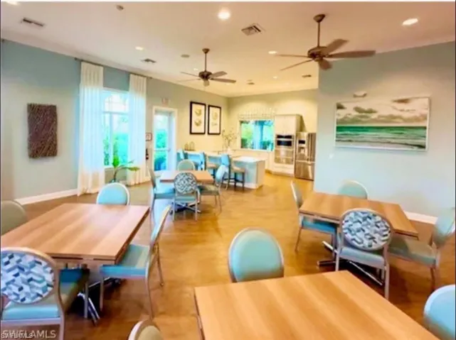 Recreation room featuring recessed lighting and wood finished floors