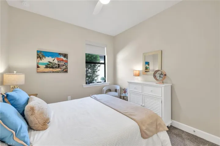 Bedroom with carpet floors and ceiling fan