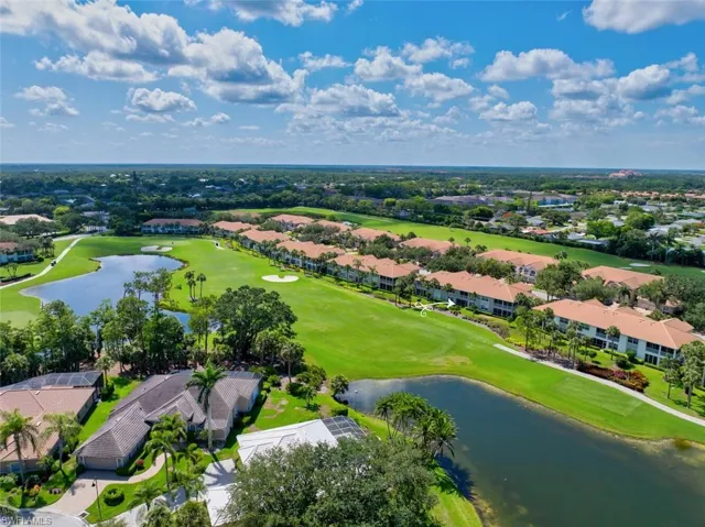 Aerial perspective of  golf course and lake