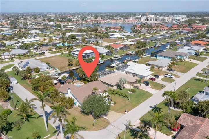 Bird's eye view featuring a water view and a residential view