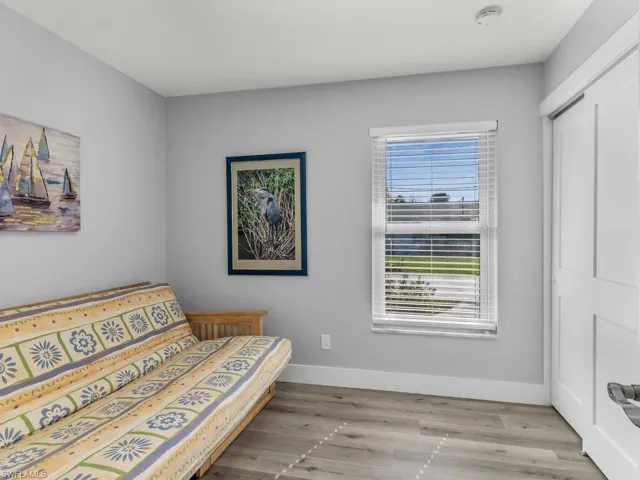 Sitting room with light hardwood / wood-style floors
