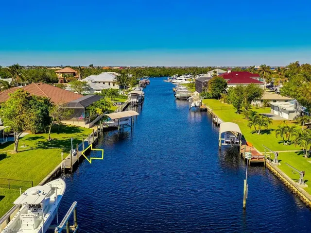 Property view of water featuring a dock