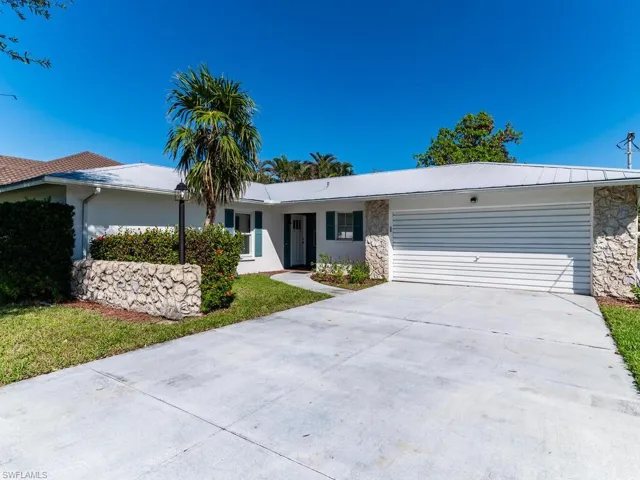 Single story home with a garage
